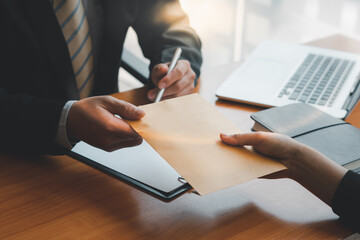 lawyer and man with envelope