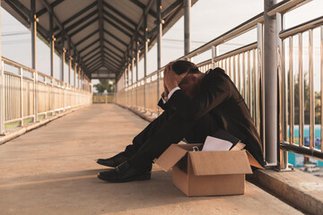 man on floor who was just fired from job