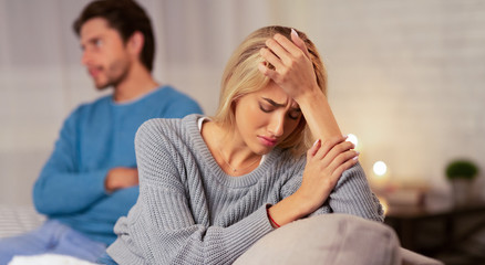 distraught woman and husband