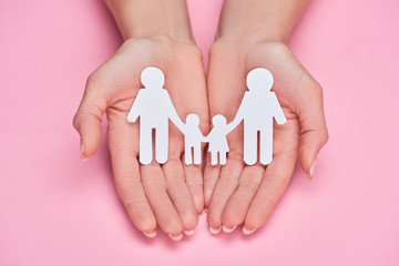 hands and cutout of family